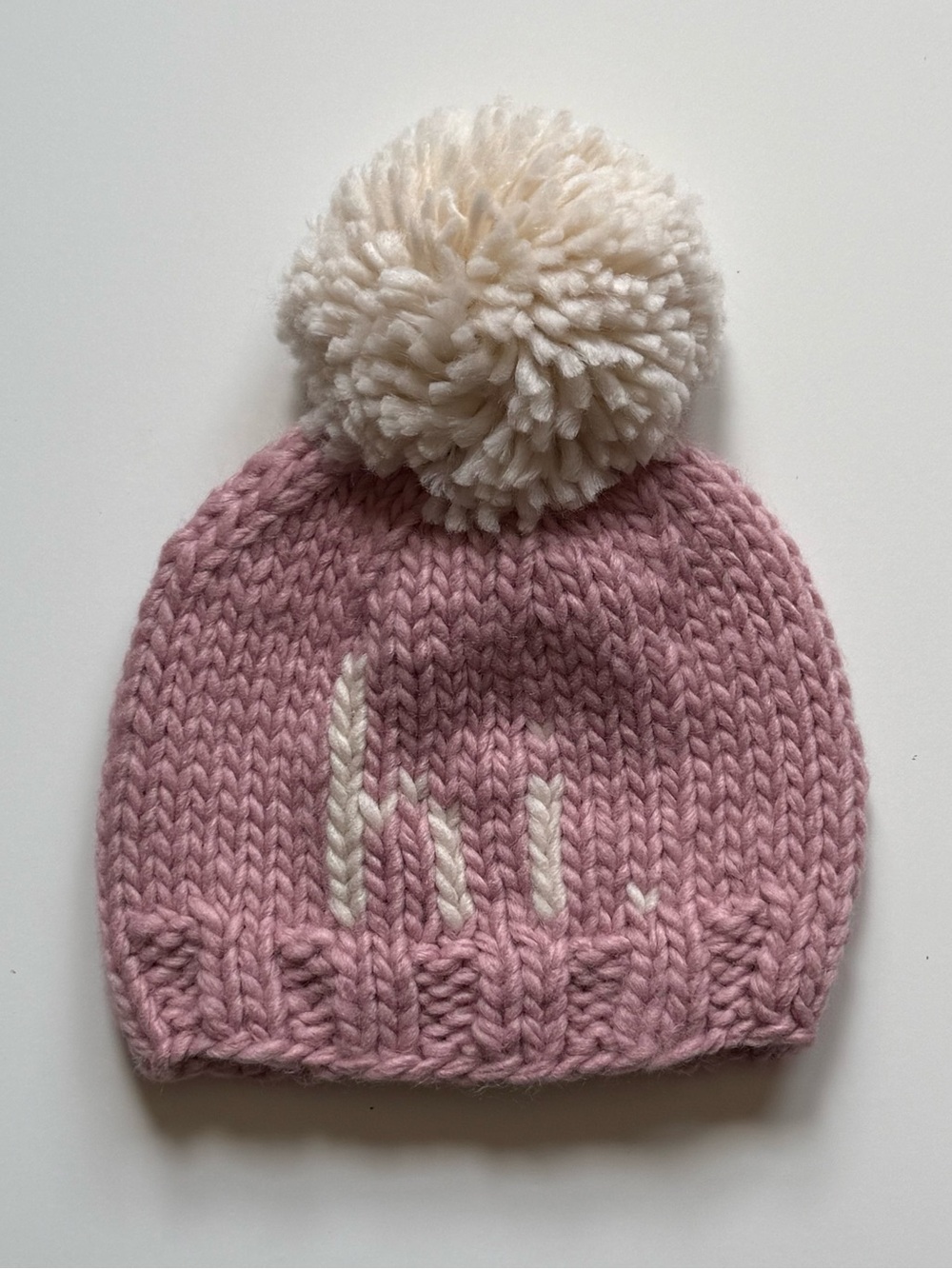Huggalugs hi. Rosy Baby Girl Pom Pom Beanie Hat - Size: Small (0-6M)